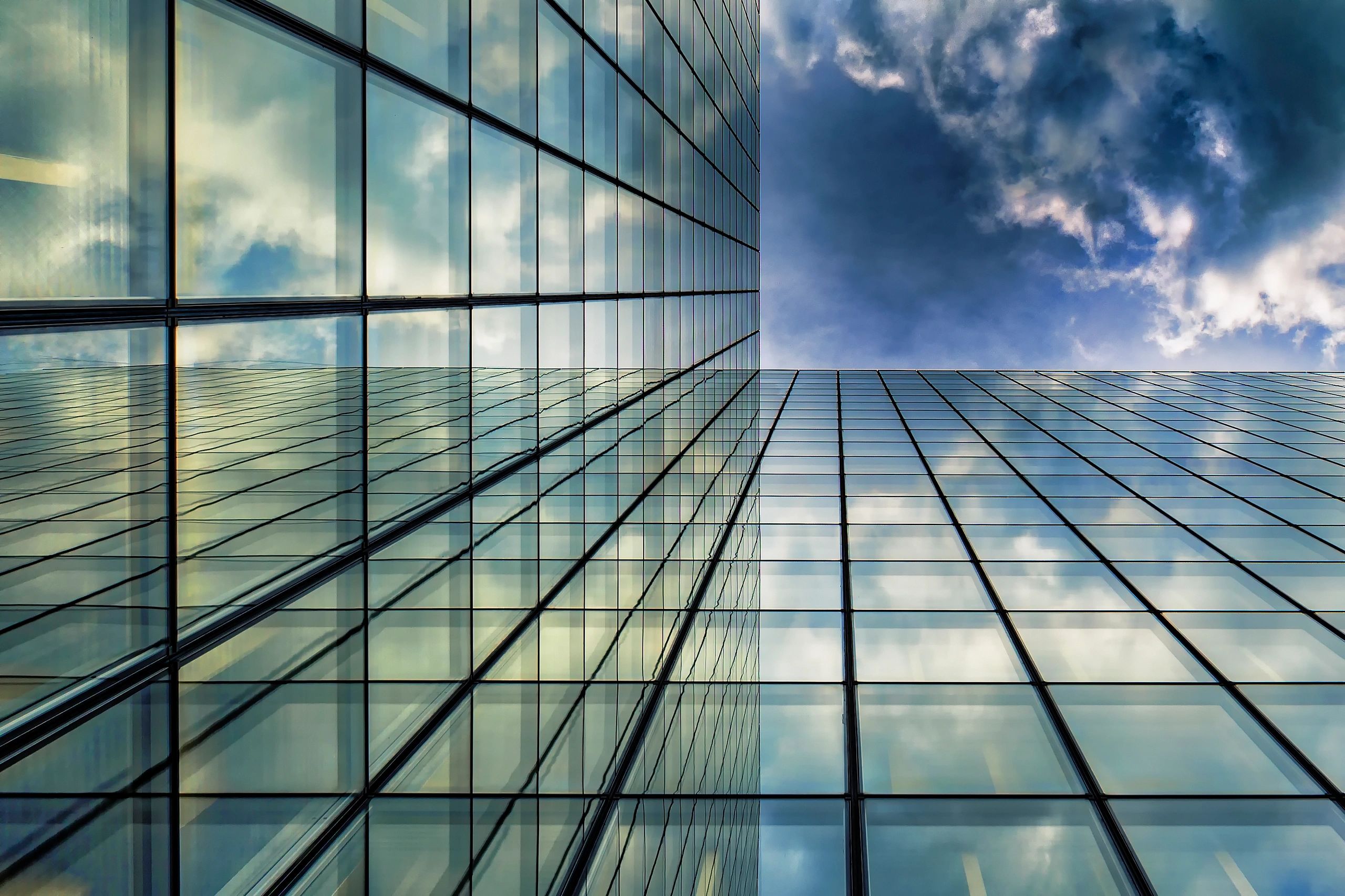 Skyscraper facade reflections and modern exterior geometry